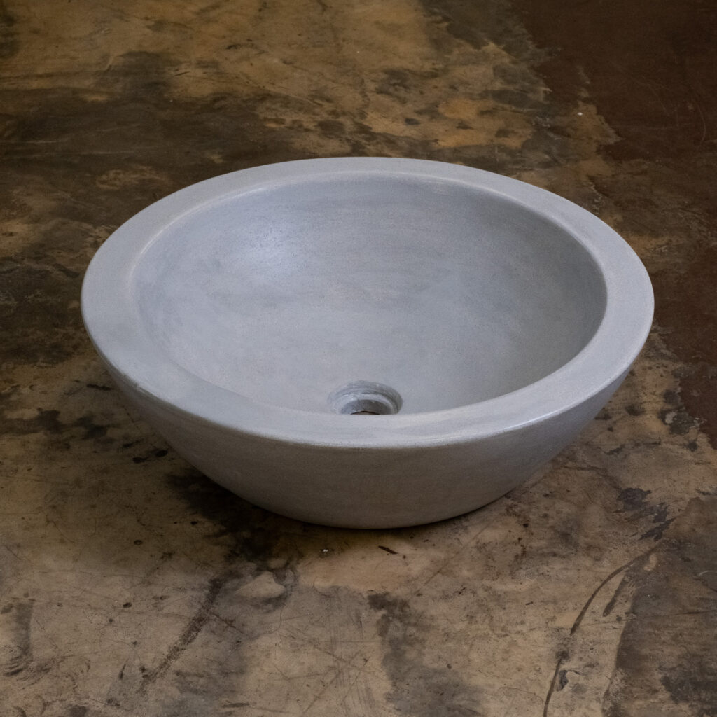 Side view of Stonecast's Provençal basin in Wolf Grey