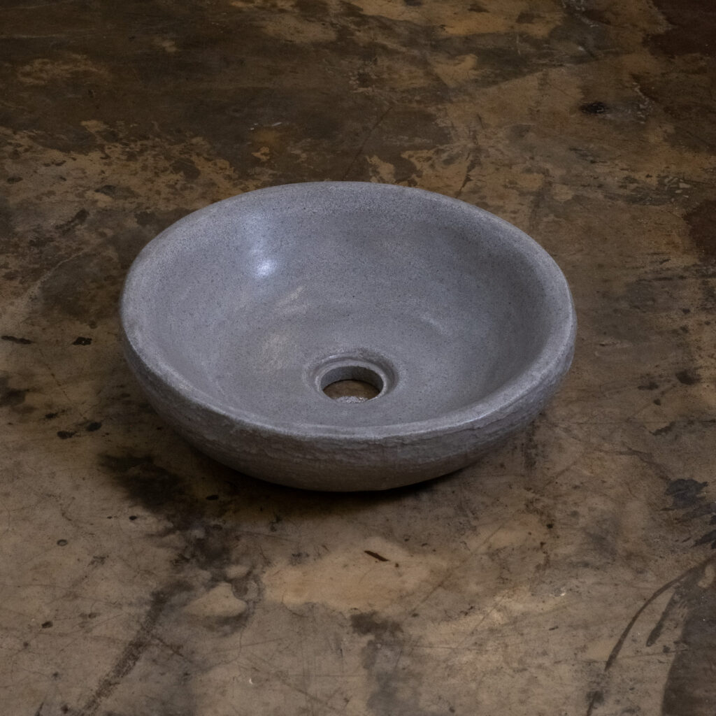Side view of Stonecast's Archaic Bowl Basin in Portland Grey