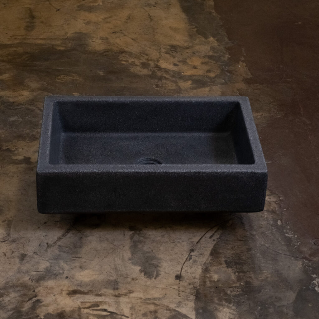 Side view of Stonecast's Lido Basin in Charcoal