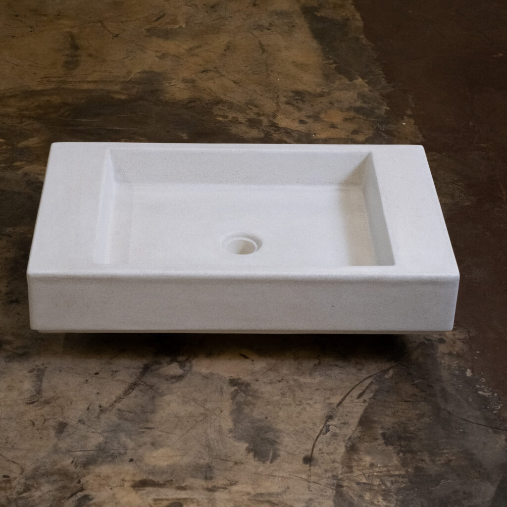 Side view of Stonecast's Westcoast basin in Sandstone White