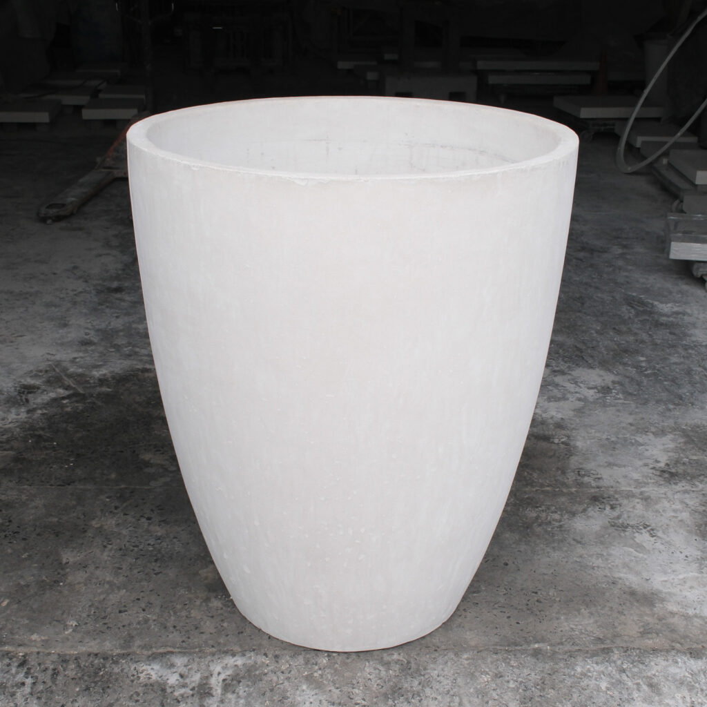 Side view of the Stonecast Pachyderm planter in sandstone white